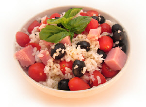 Rice salad with ham cubes